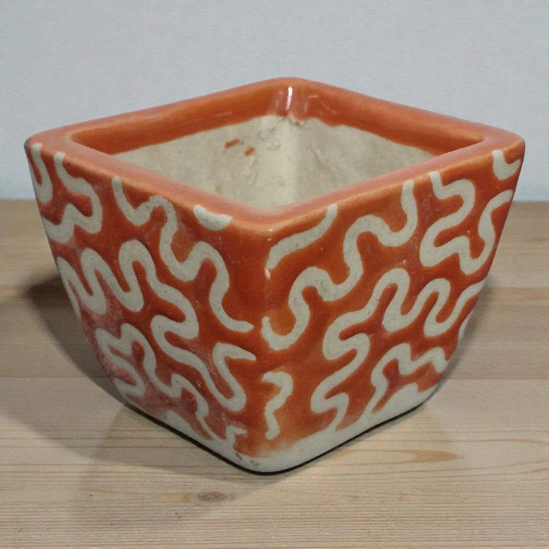 Orange And White Ceramic Pot