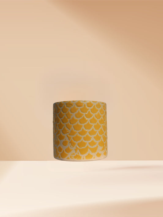 Yellow cylindrical cup pot