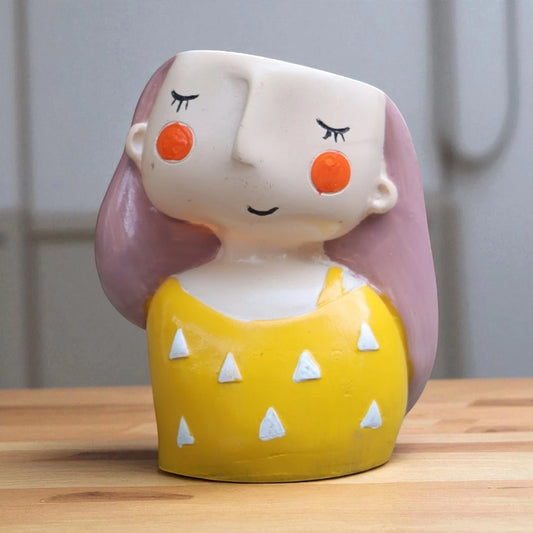 Yellow girl planter