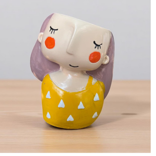 Yellow girl planter