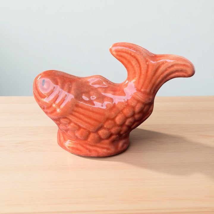 Small pink fish miniature