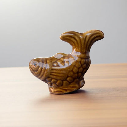 Small brown fish miniature
