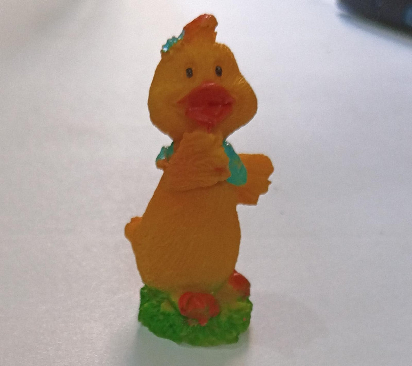 Tiny baby chicken miniature, perfect for adding a playful touch to indoor settings.