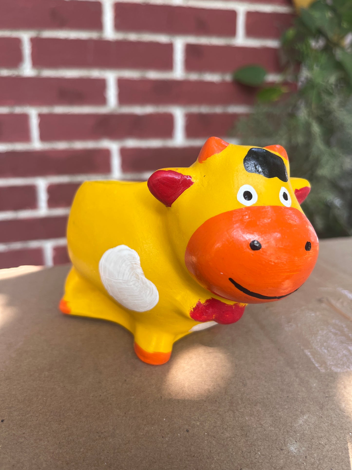 Adorable cow-shaped planter, perfect for housing succulents or small indoor plants. This cheerful and colorful planter adds a playful touch to any space, making it ideal for enhancing your indoor plant display. Find unique succulent pots like this at Plant Orbit.