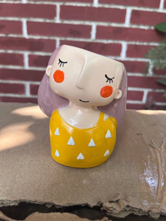 Yellow girl planter