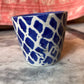 Round blue shed cup