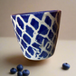 Round blue shed cup