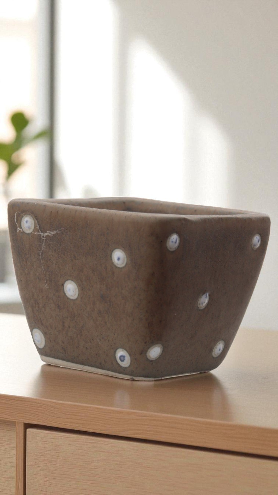 Brown shed cup pot