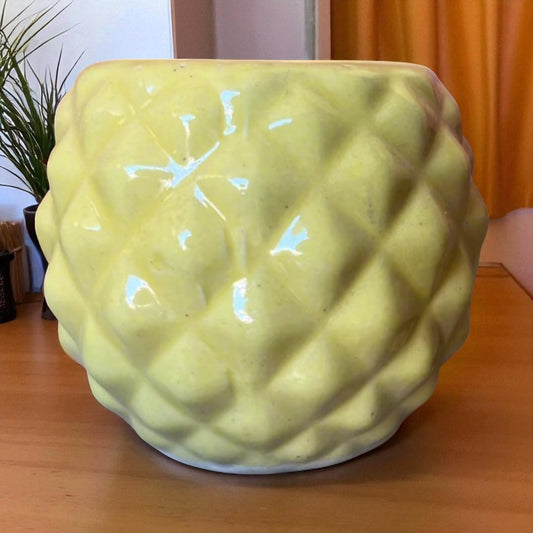Round yellow cup pot