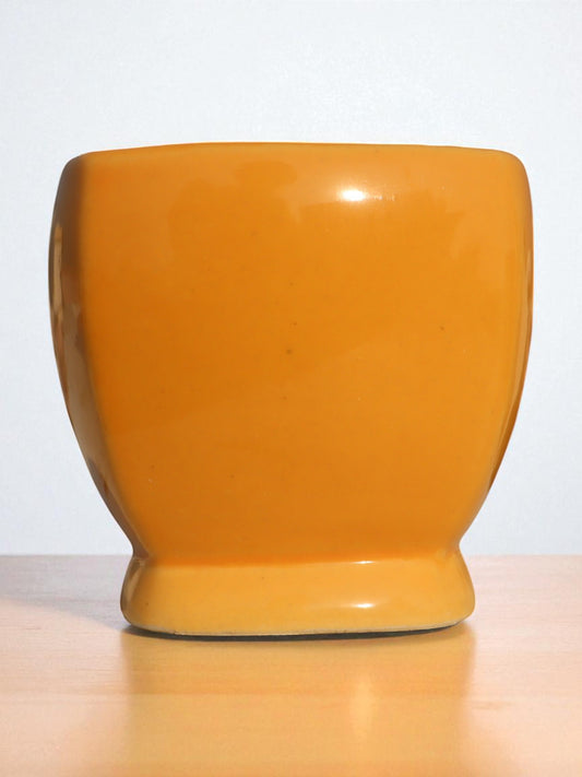 Yellow cup pot