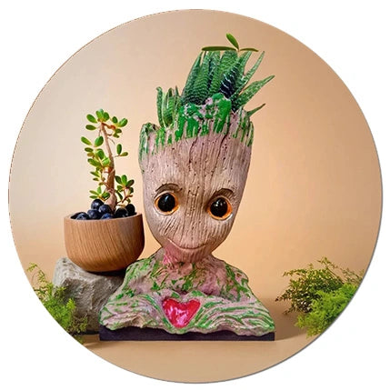 Creative Groot-inspired planter with succulents and a decorative wooden pot holding a jade plant, perfect for adding charm to your indoor plant setup. Explore unique pots and planters at Plant Orbit to enhance your collection of indoor plants, succulents, and cactus plants.